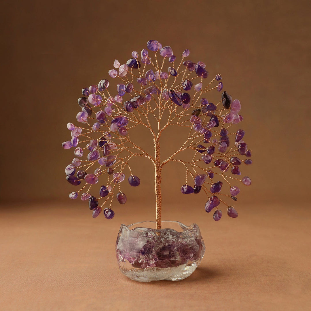 Purple gemstone crystal tree on a clear crystal bowl base