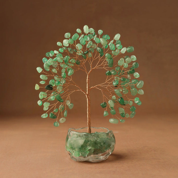 Crystal tree decor with green gem leaves and wire trunk in clear glass base