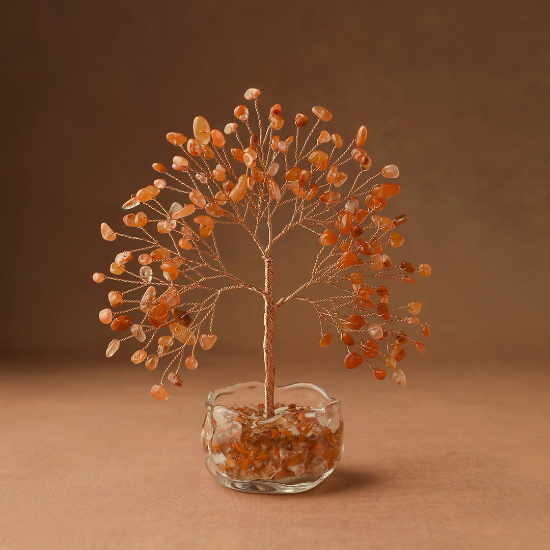 Crystal tree decor with orange gem leaves and wire trunk in clear glass base