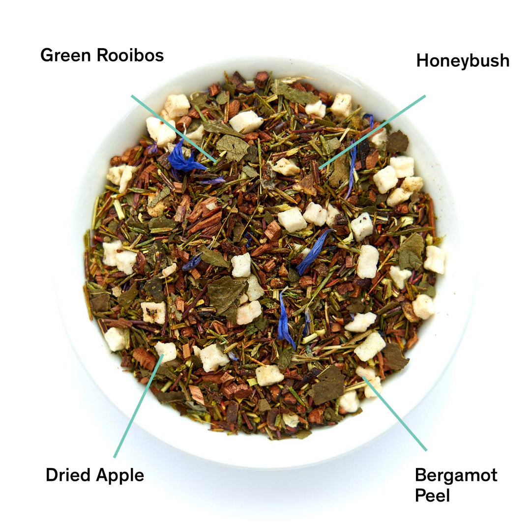 Loose tea leaves with dried apple, bergamot peel, honeybush, and green rooibos