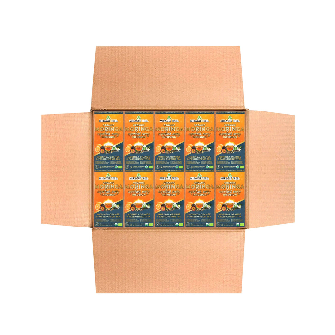 Cardboard shipper with multiple Miracle Tree Organic Moringa tea pouches, front view