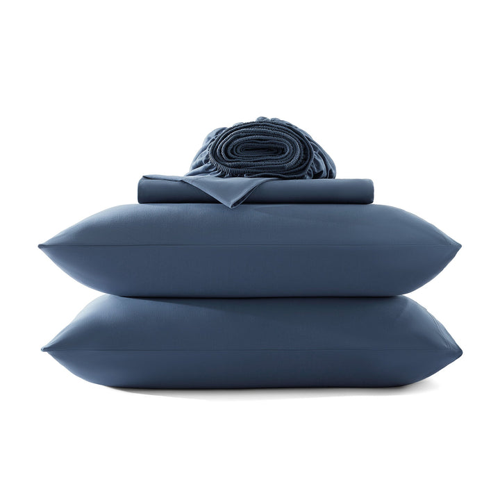 Cotton jersey sheet set, midnight blue, folded stack with rolled top hem