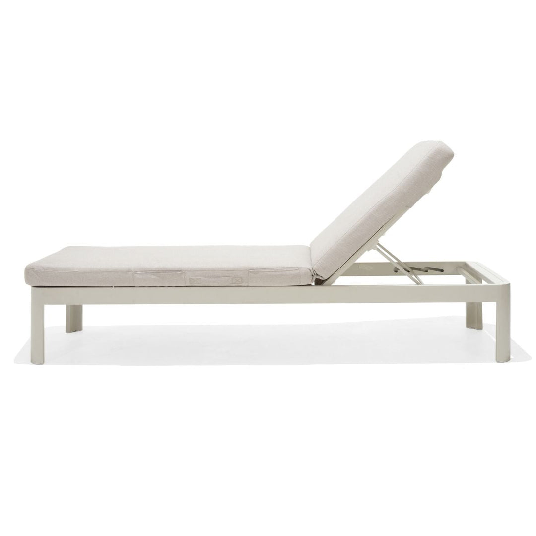 Light beige sun lounger with adjustable backrest in reclined position, white frame