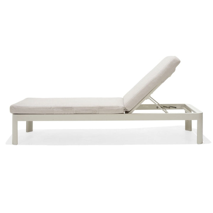 Light beige sun lounger with adjustable backrest in reclined position, white frame