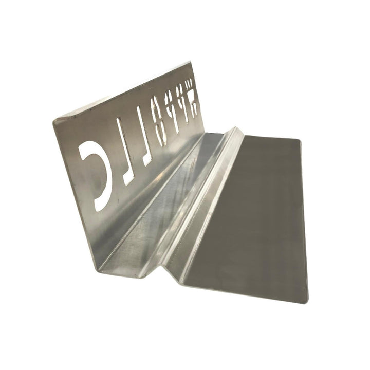 Metal heat deflector shield insert with angled shape and engraved lettering