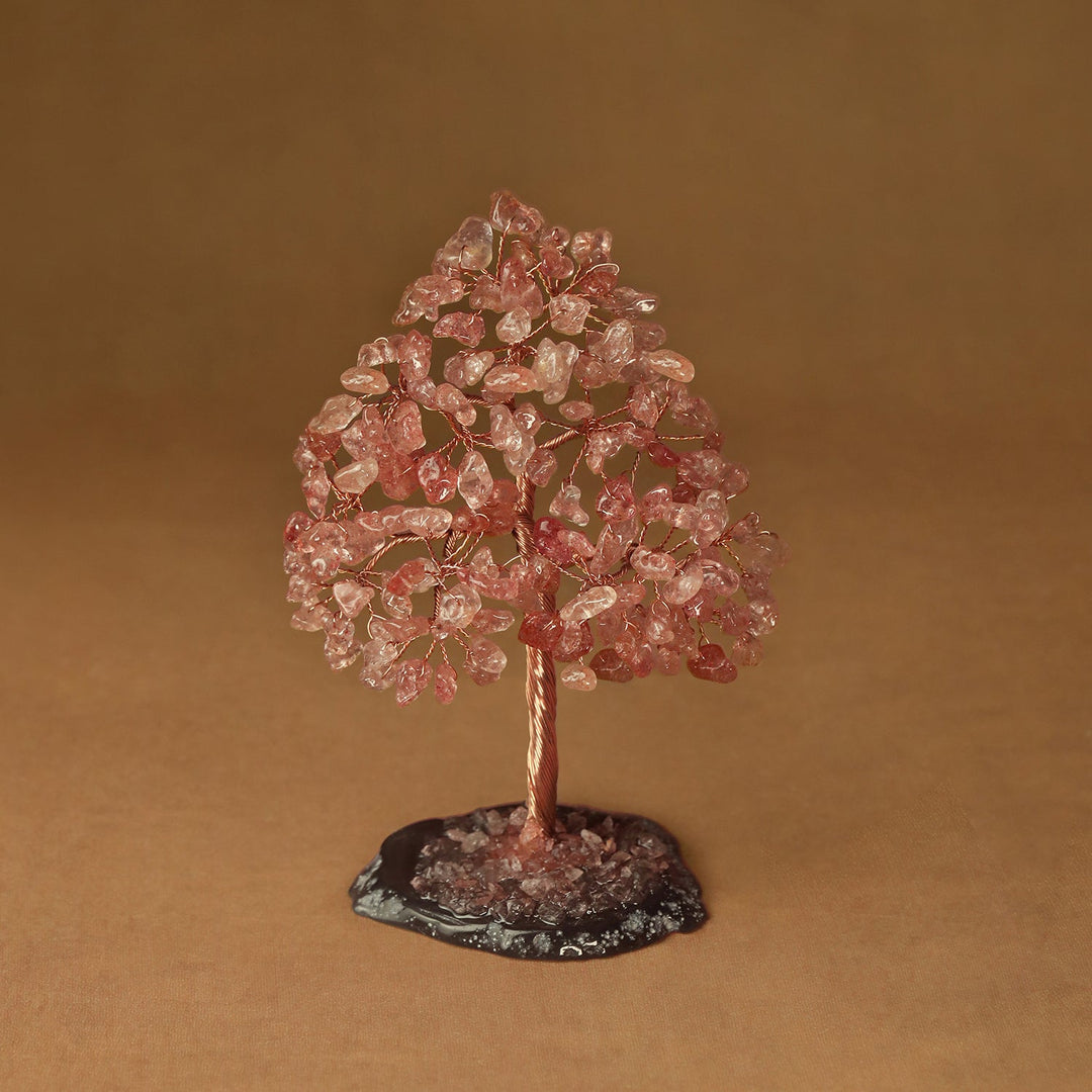 Rose quartz pink crystal tree sculpture with wire trunk and gemstone chip canopy on base