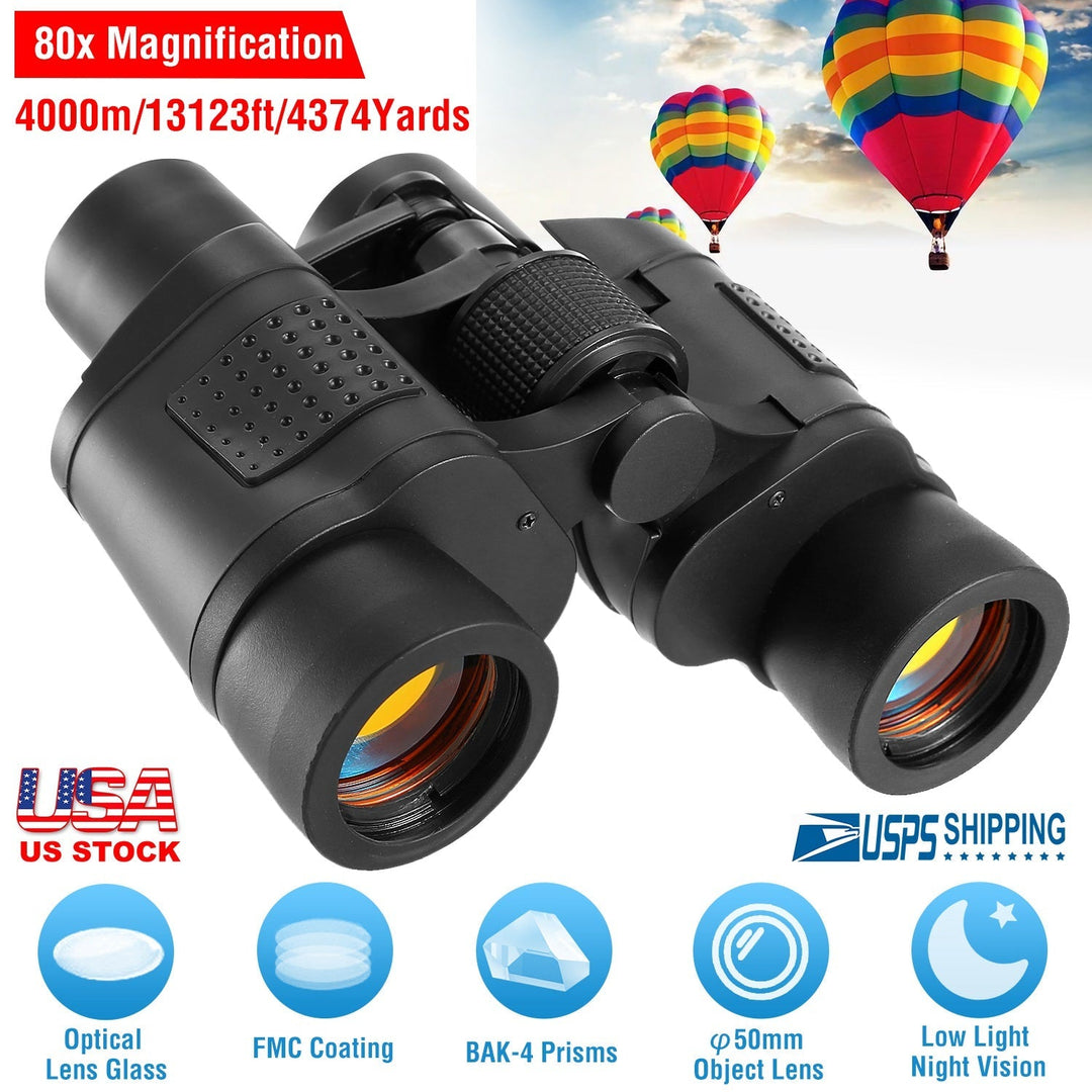 Black binoculars with wide objective lenses and central focus control knob