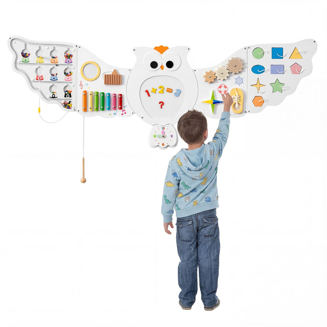 Owl learning wall board with number display, xylophone keys, gears, and shape matching pieces