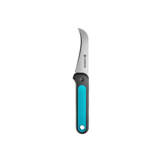 VeggieCut scissors with black handle, blue textured grip, and curved stainless blade