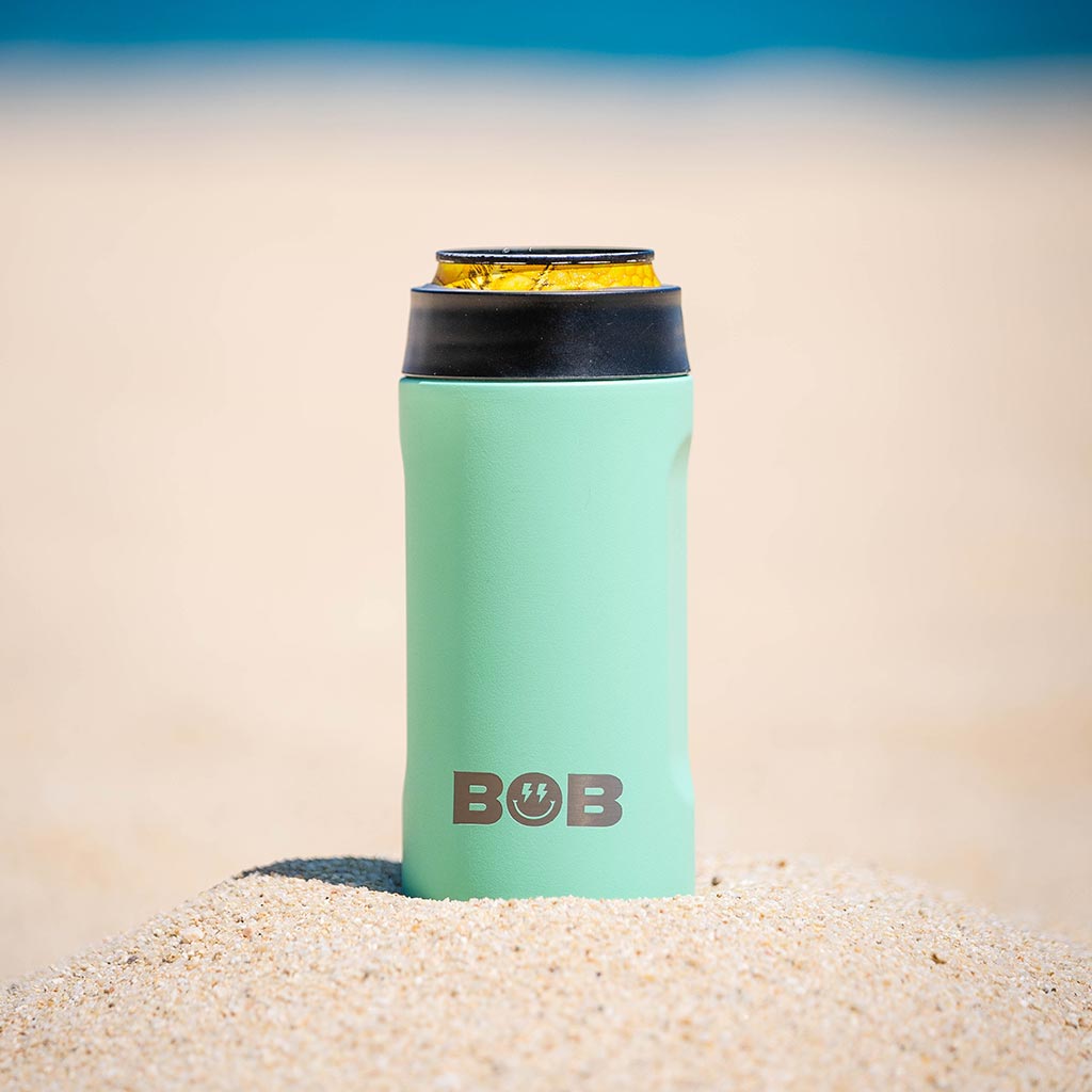 Mint green slim can cooler with black collar and BOB logo