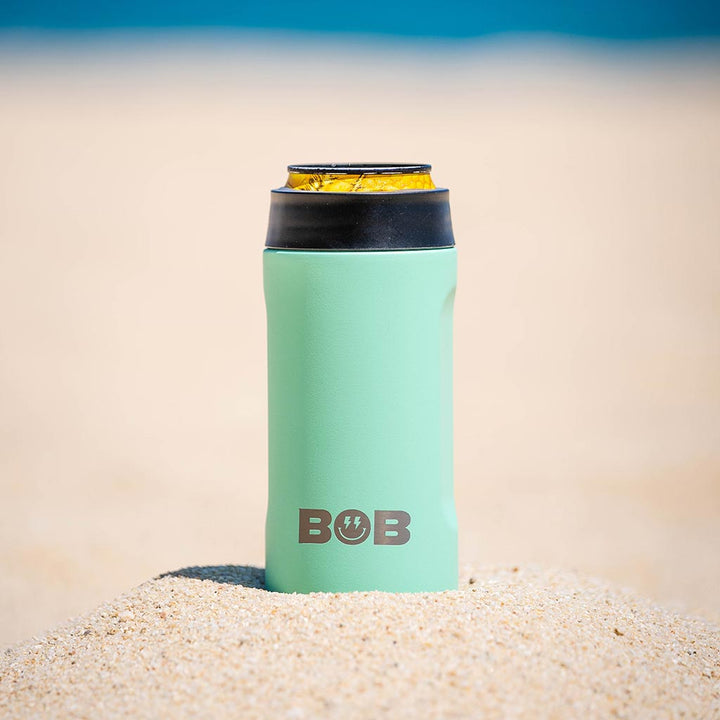 Mint green slim can cooler with black collar and BOB logo