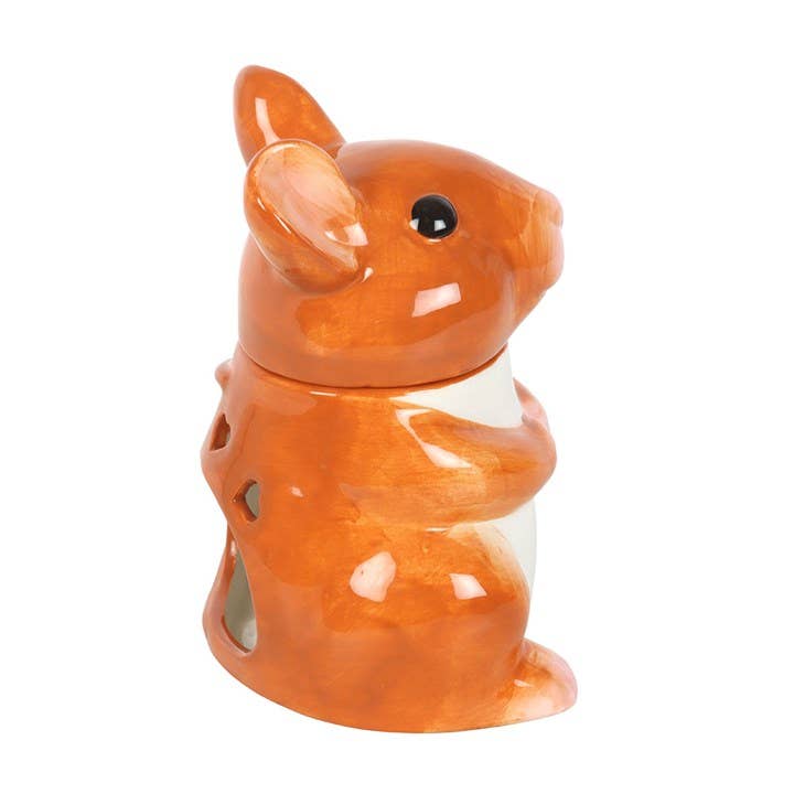 Mouse-shaped ceramic oil burner in orange with white band and dark eye details