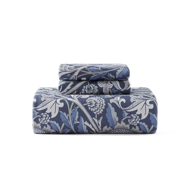 Cotton jersey duvet cover set with navy floral pattern, folded with top flap