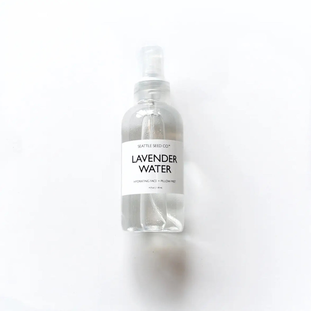 Lavender water face and pillow mist bottle with clear spray top and label