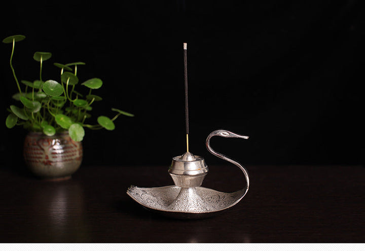 Silver-toned swan incense holder with standing incense stick and curved hook