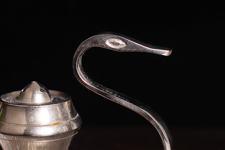 Silver-toned swan-shaped incense holder with curled neck and stacked cup base