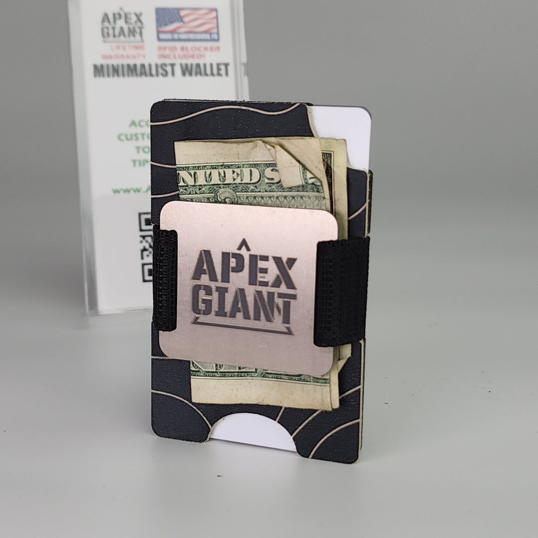 Minimalist wallet with black wavy design, holding cash and cards, elastic side strap