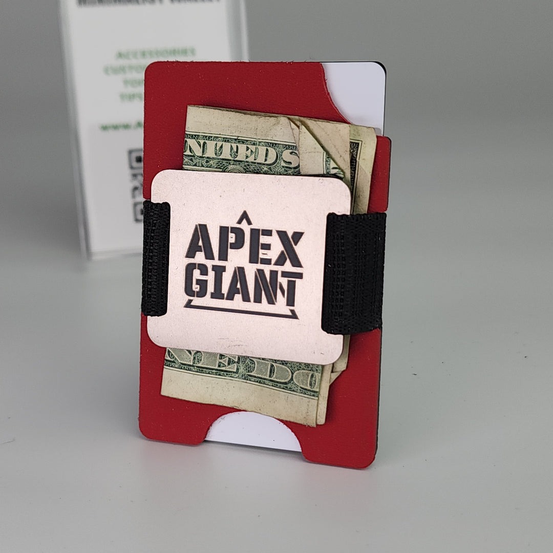 Red APEX GIANT wallet with black elastic band holding cards and cash
