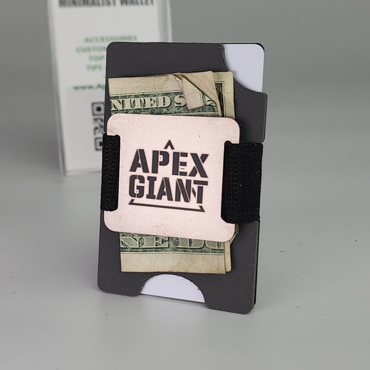 Gunmetal gray minimalist wallet open, showing cards and cash with black elastic bands