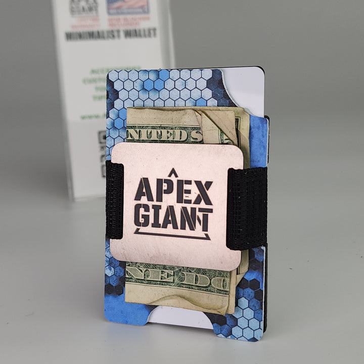 Minimalist wallet with blue hex pattern and black elastic band holding cash