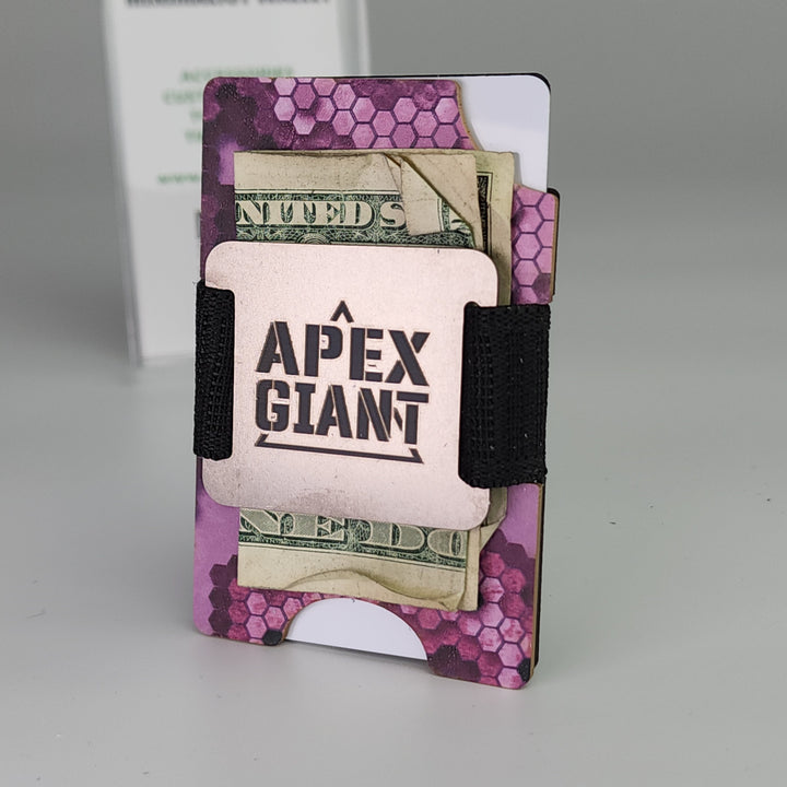 Minimalist wallet holding several cards; purple hex-pattern outer with black elastic strap