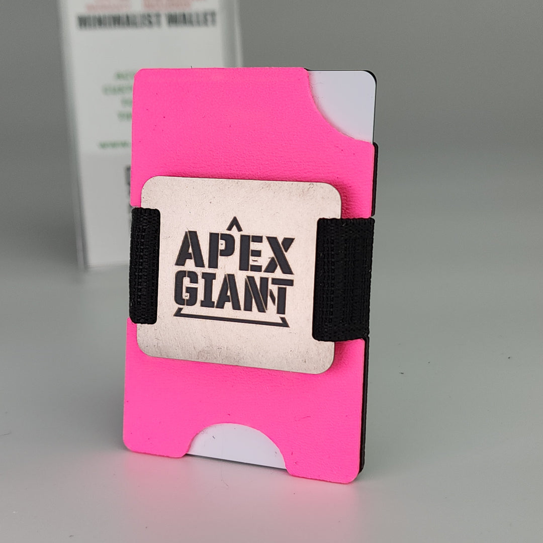 Hot pink minimalist wallet with black elastic band and APEX GIANT card insert