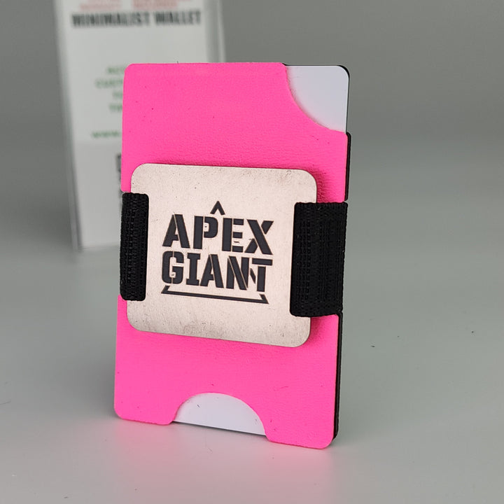 Hot pink minimalist wallet with black elastic band and APEX GIANT card insert
