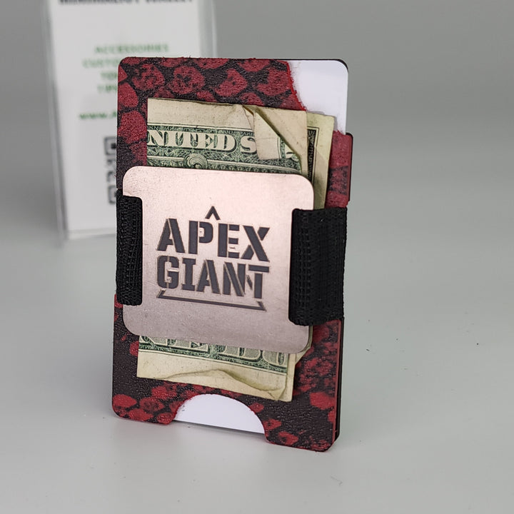 Red snake-skin minimalist wallet holding cards, black elastic strap, APEX GIANT logo