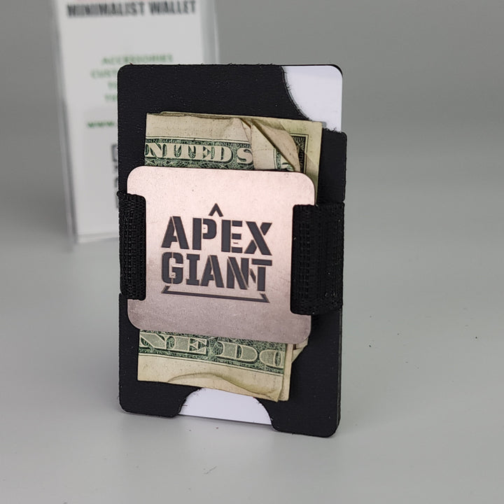 Black APEX GIANT wallet holding folded cash and card in front slot