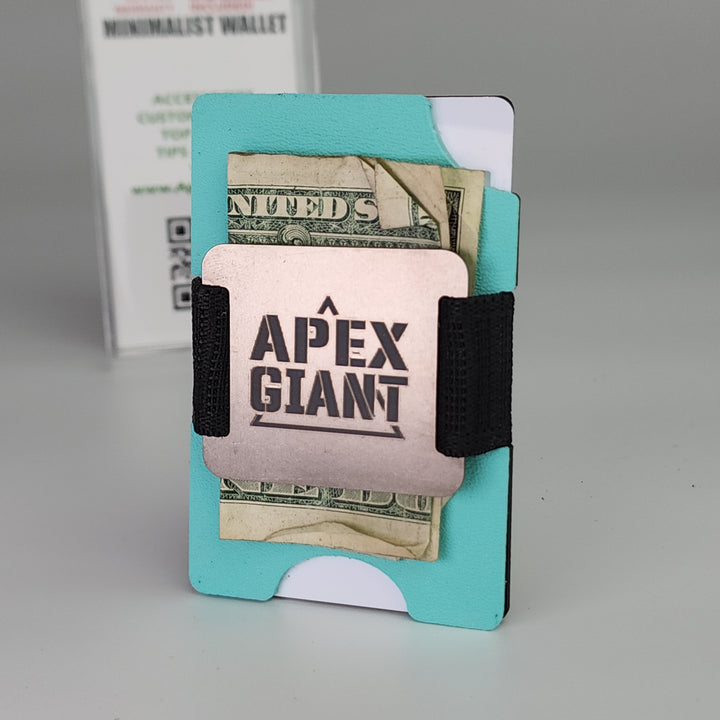 Tiffany blue APEX GIANT wallet with black elastic band holding cash and cards