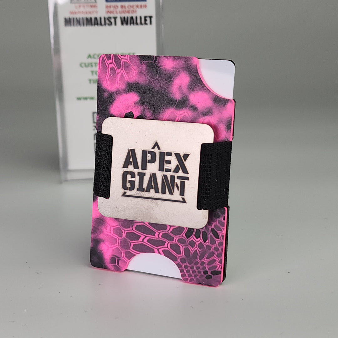Minimalist wallet with hot pink camo pattern and black elastic side straps