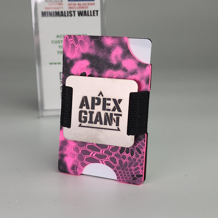 Minimalist wallet with hot pink camo pattern and black elastic side straps
