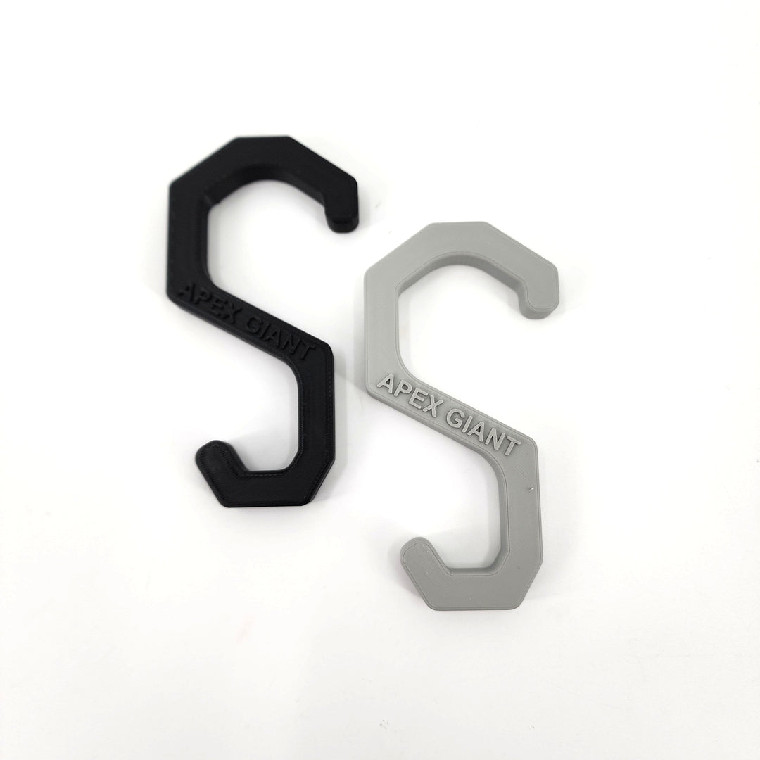 Gear hanger set: black and gray plastic hooks with hanging loop, stamped &