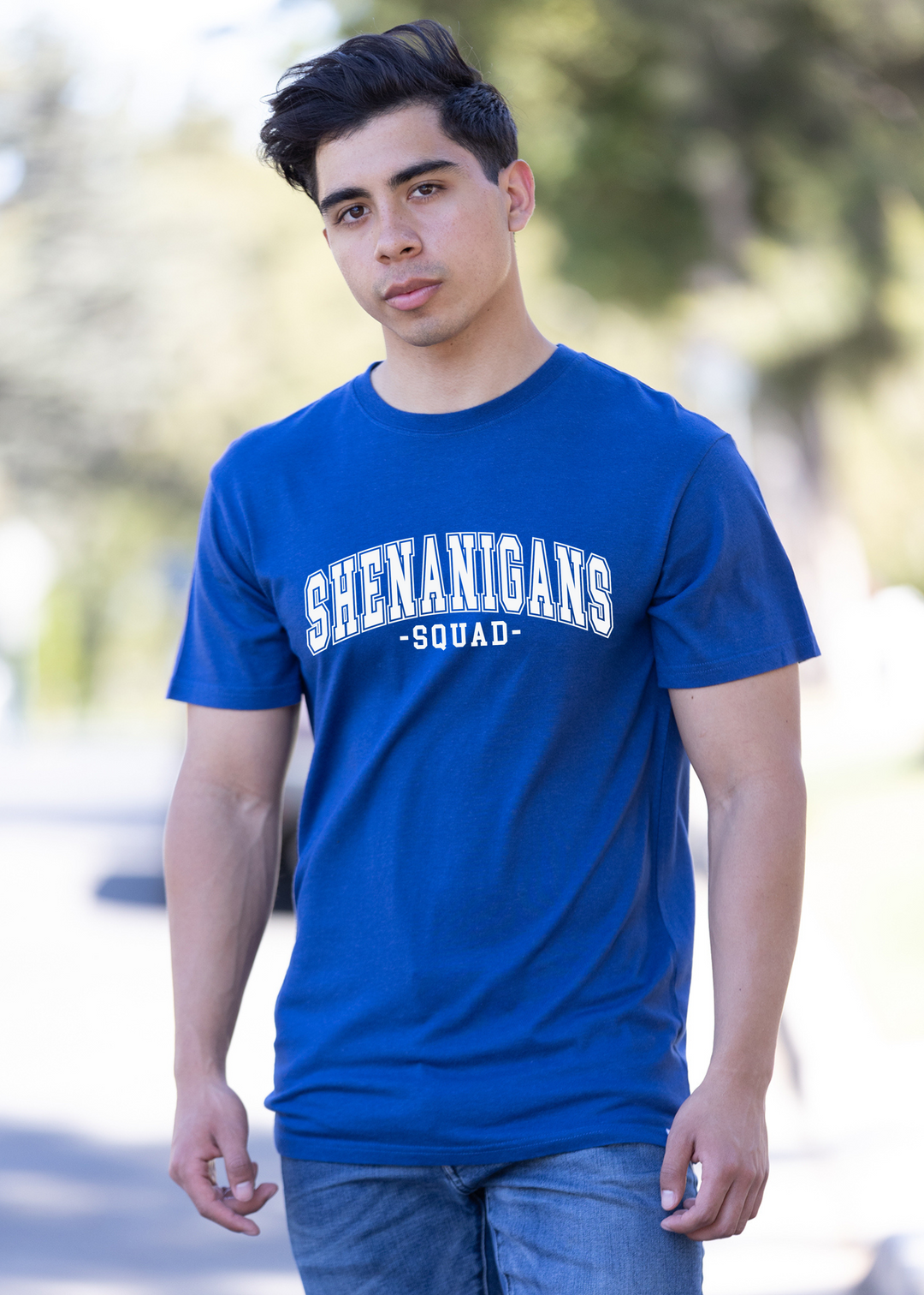 Royal blue unisex graphic T-shirt with white “SHENANIGANS SQUAD” chest print