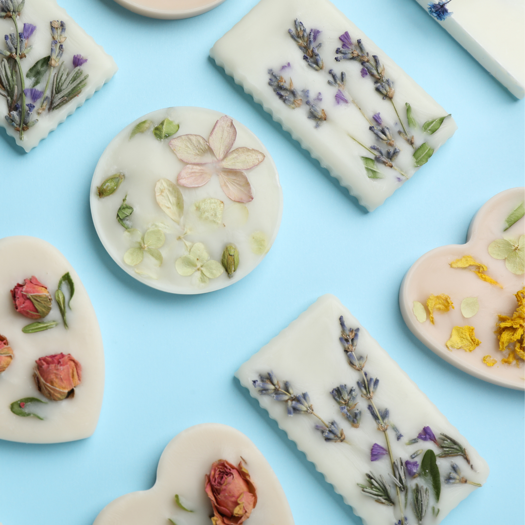 Set of lavender wax sachets with dried botanicals on round and rectangle shapes