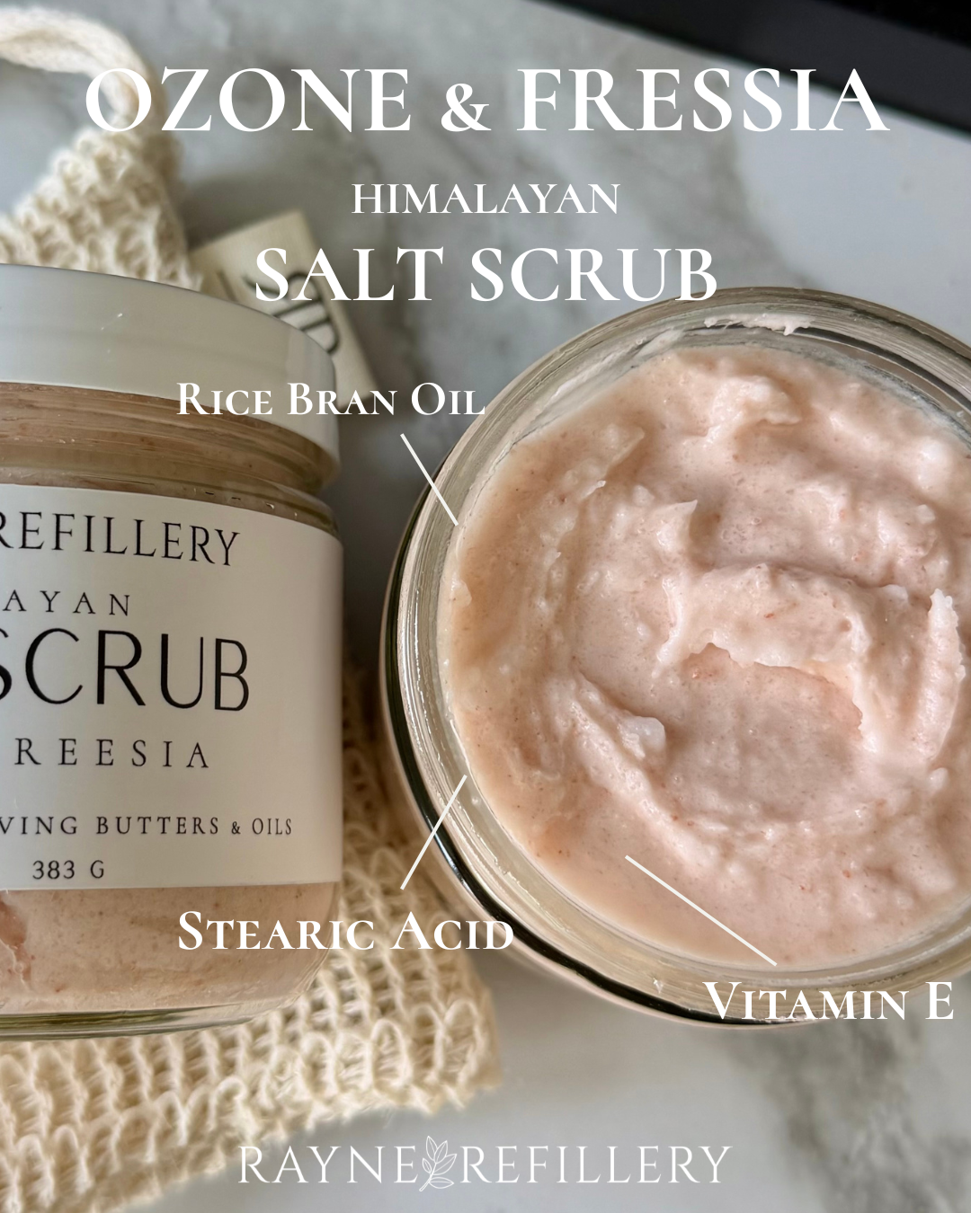 Open Himalayan salt scrub jar with thick whipped pink cream texture