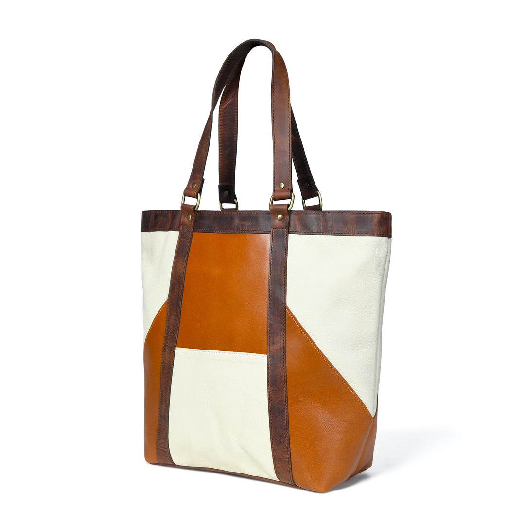 Orange-brown and cream leather tote with geometric side panel detail