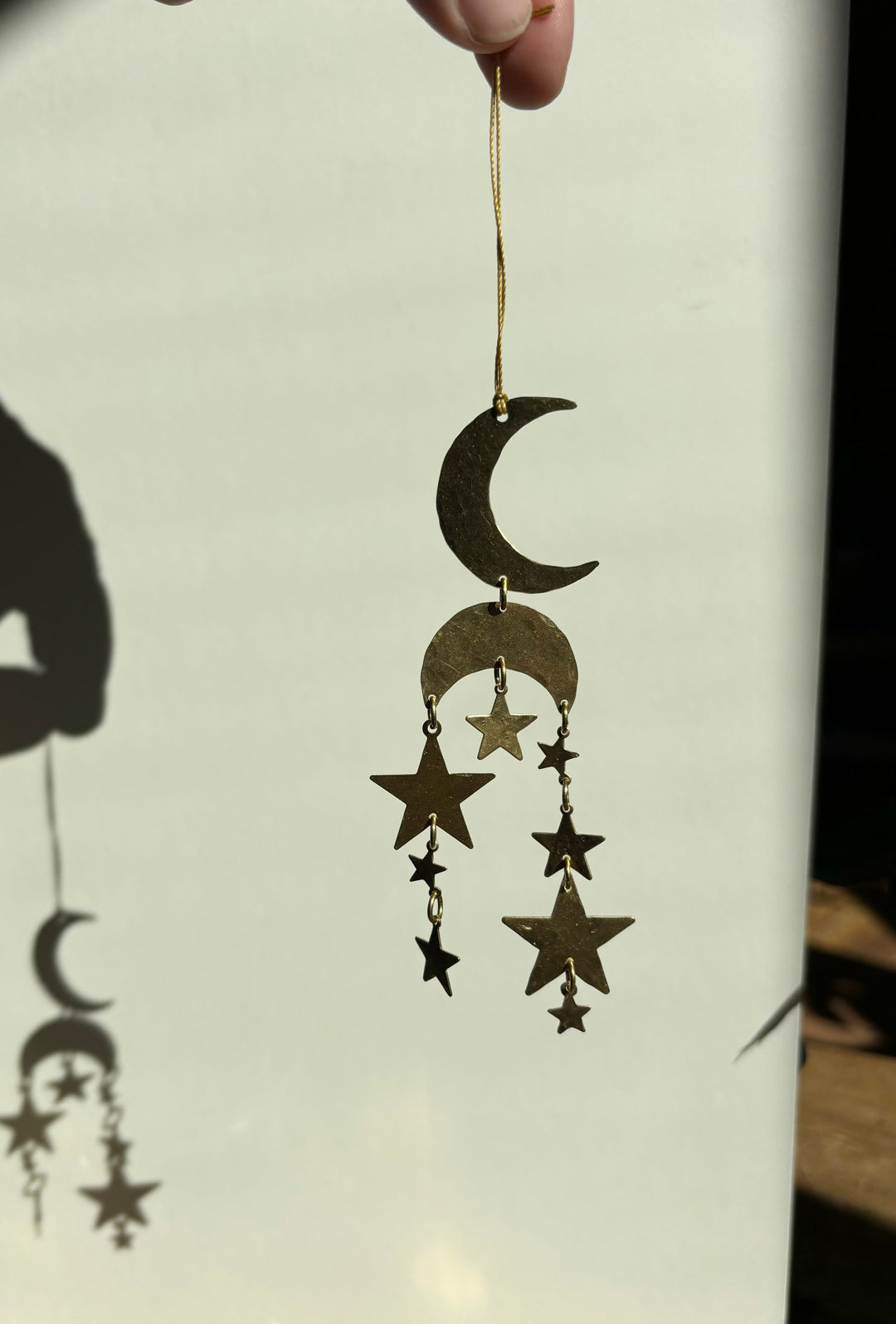 Gold crescent moon and dangling star ornament with hanging chain loops