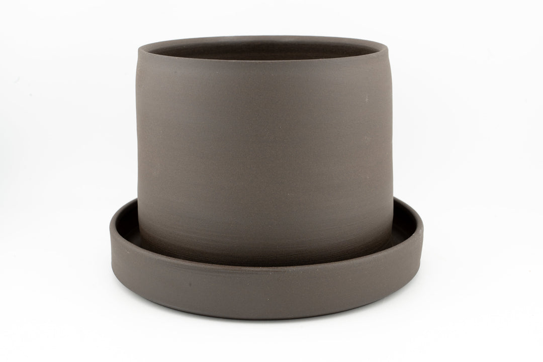 Brown unglazed stoneware tabletop planter with drainage tray, round open pot