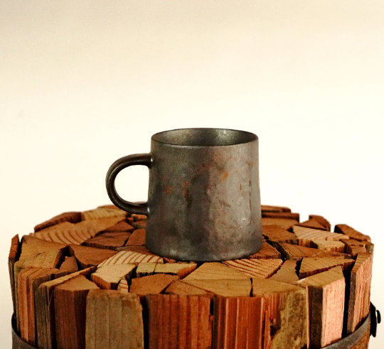 Stone-gray and bronze espresso mug, speckled metal cup with curved handle
