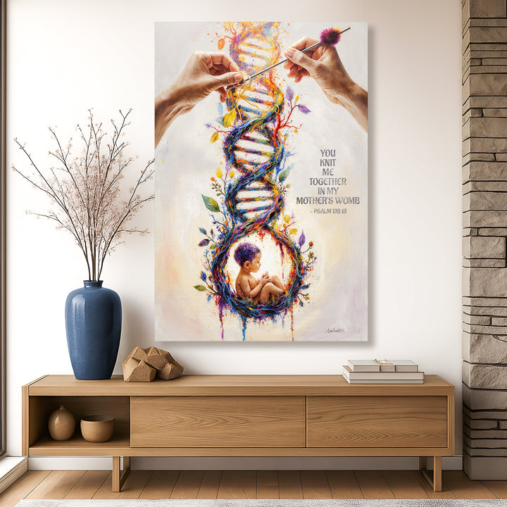 Vertical canvas wall art with colorful DNA heart, baby figure, and hands forming the lines