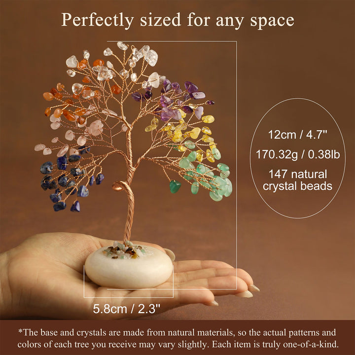 Handheld crystal tree ornament with multicolor gemstone leaves on white stone base