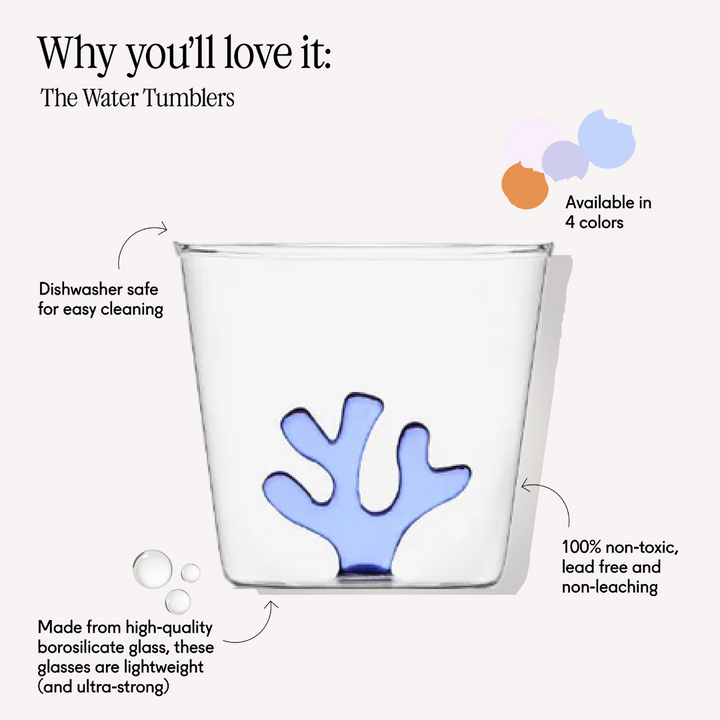 Clear glass water tumbler with blue coral graphic on the front