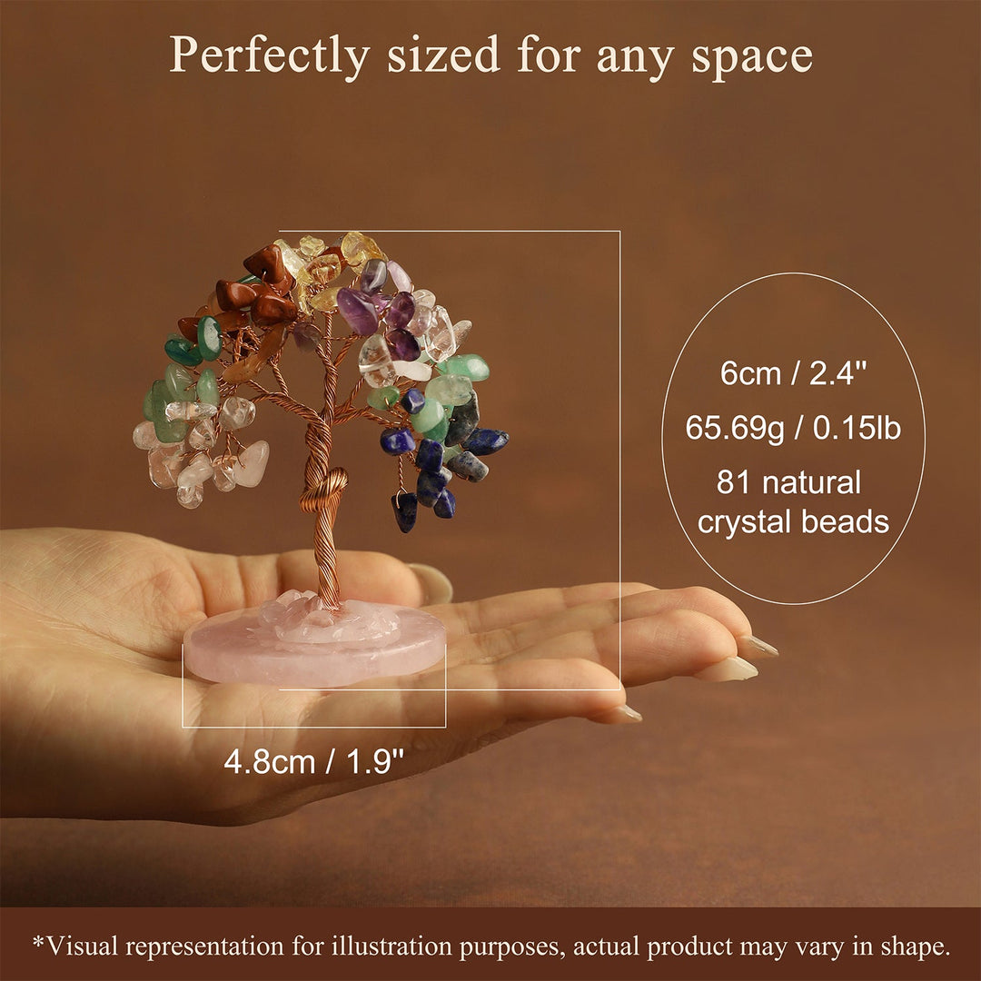 Mini gemstone crystal tree on rose base held in hand, multicolor crystal branch clusters