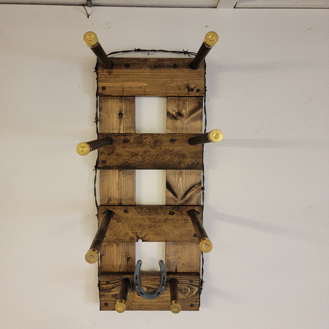 Wooden vertical wall organizer with four-bar hat holder frame and hanging pegs