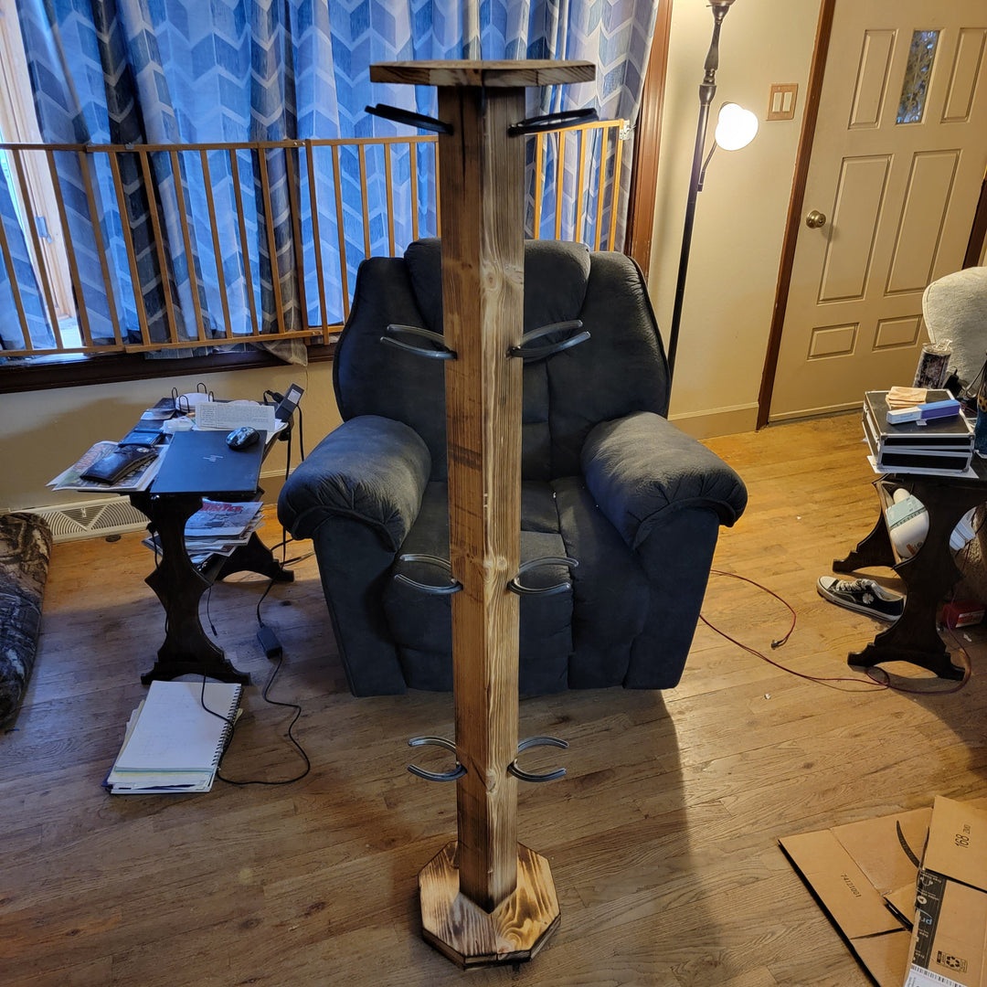 Wooden cowboy boot floor stand with multiple horizontal pegs for up to 8 pairs