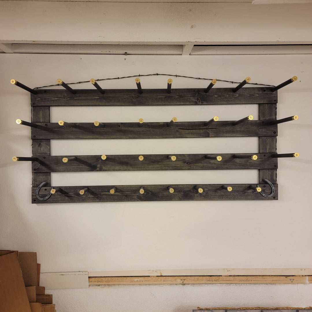 Horizontal wall-hanging western organization board with rows of peg hooks and black finish