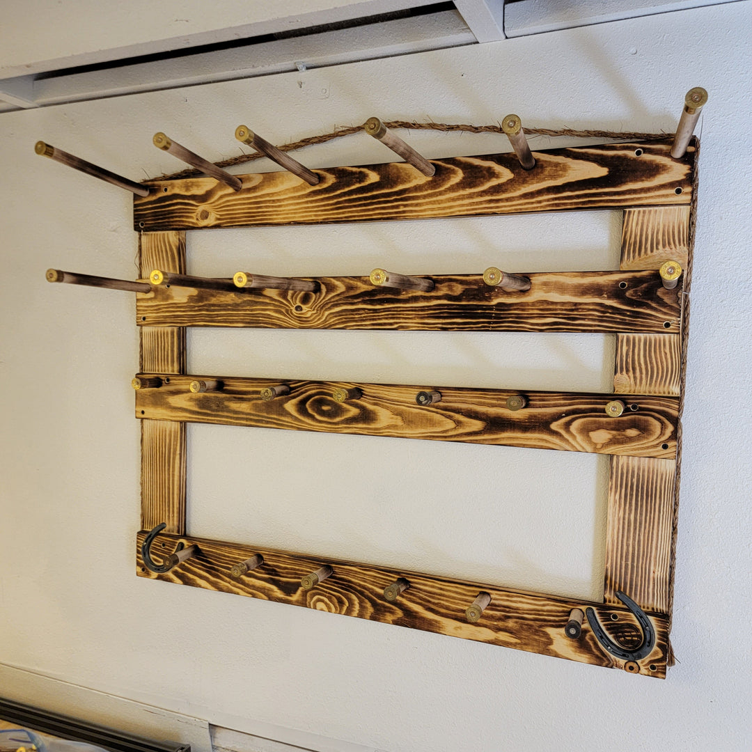 Wood hat display frame with hanging pegs and an empty center opening