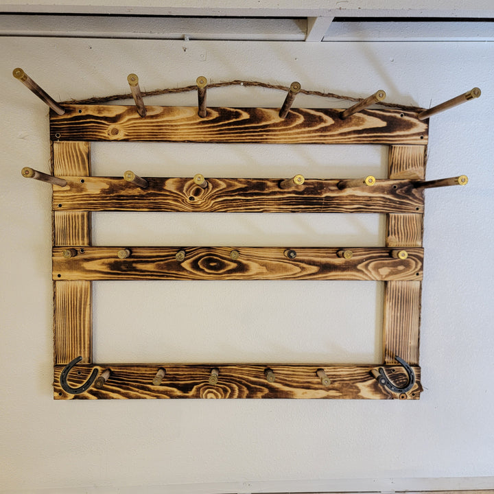 Wooden hat rack frame with three peg rails and a large empty window opening