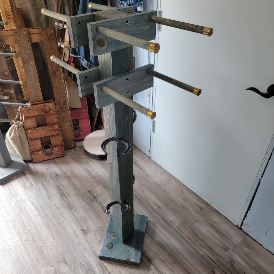 Freestanding wooden boot tree with multiple crossbars and curved metal hooks